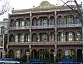 Holcombe Terrace, Carlton, Victoria; completed 1884. One of Australia's best examples of the residential filigree style executed in polychrome brick.