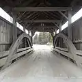 Holmes Creek Covered Bridge Trusses, Charlotte, VT (Looking toward South): 26 Apr 2015