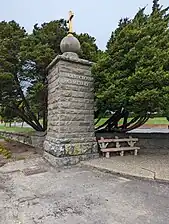 Stone-topped gate pillar on Mission Road, completed in 1902