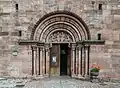 Romanesque main portal (1230s)