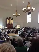 A string quartet playing chamber music in the Room