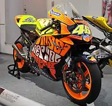 The Repsol Honda RC211V, ridden by Valentino Rossi in the 2003 season on display with a special livery.