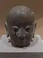 Statue head of a Buddhist arhat, Western Xia dynasty, from Hongfo Pagoda, Helan County, Ningxia