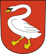 The Swiss municipality of Horgen uses a depiction of a swan on its flag. The swan symbolizes the location of the town at Lake Zurich, as well as Horgen's political status as administrative capital of the same named cantonal district.