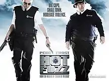 Film poster of two men dressed as British police officers. The man on the left is looking down and is holding a shotgun and a handgun. The man on the right is behind the man on the left with a shotgun and toothpick in his mouth and an explosion behind them. Poster has the film's title and the main stars names.