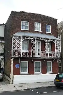 exterior of small, pretty early 19th-century house