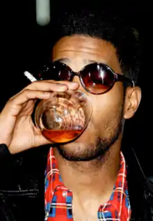 African American man having a drink