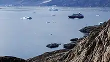 M/S Fram of Hurtigruten cannot be serviced directly by Uummannaq port due to the shallowness of the port inlet