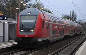 A new double-decker train, produced in 2004, running on line S10 in November 2013 at Leipzig Olbrichtstraße railway stop