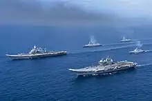 Vikrant  with Vikramaditya with two Kolkata-class destroyer and a Talwar-class frigate.