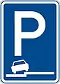 Parking partly on the pavement (in line with traffic)