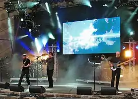 IQ at the Night of the Prog Festival, 9 July 2011.  L-R: Mike Holmes, Paul Cook (hidden), Peter Nicholls, Neil Durant, and Tim Esau.