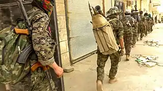 A column of IRPGF fighters during the Battle of Tabqa