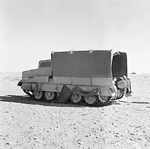 Crusader tank in Sunshield camouflage cover