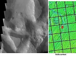 Iani Chaos, as seen by THEMIS.  Sand from eroding mesas is covering brighter floor material.