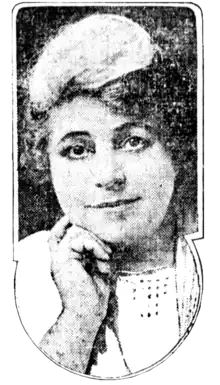 A newspaper photo of a white woman with large dark eyes