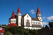 Church of the Sacred Heart of Jesus (Puerto Varas), an example of the use of wood in the architecture of the south of the country, which ranges from German-Romanesque Revival to Carpenter Gothic, and which displays German-Chilean syncretism.