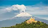 Iglesia de Nuestra Señora de los Remedios atop Great Pyramid (Tlalchihualtépetl) in Cholula, Puebla, with the volcano in the background