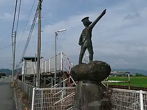 Statue of a kappa near the station entrance