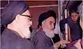 Ayatollah Khomeini before a speech at Alavi school