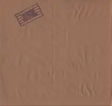 One of paper bag sleeve variants for original vinyl release, whose stamped logo was also used as part of front cover for original tape releases, and 2015 remastered.