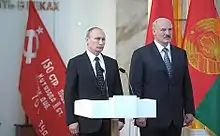 Vladimir Putin and Alexander Lukashenko attending the inauguration of a new building in the museum in 2014.