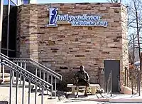 A view of the entrance, including the sign and the statue of Jefferson.