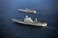 INS Viraat (top) escorting the Indian Navy's newly acquired aircraft carrier Vikramaditya during the latter's delivery voyage