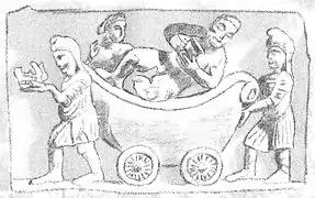 Indo-Scythians pushing along the Greek god Dionysos with Ariadne.