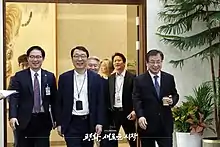 The Korean information agency chief Suh Hoon, South Korean envoys are entering into the inter-Korean meeting room. Suh Hoon inside the Peace House.