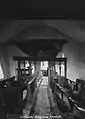 Interior of a Medieval Welsh church c. 1910