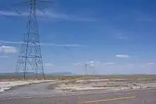 Path 27 as seen on U.S. Route 50 in Utah. An AC transmission line has since been built alongside this segment of the HVDC line.