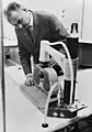Demonstrating a mechanical heart massage device, Vienna, 1967