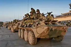 Russian Engineer Troops ride desant aboard BTR-82As in Aleppo, Syria, in December 2016