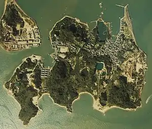 Island with forests, lakes, buildings, and quays