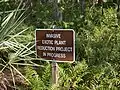 Invasive plant reduction in progress sign at Lake Seminole Park