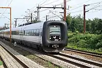 An IR4 EMU train passing Hvidovre Fjern near Copenhagen