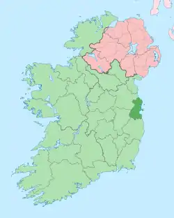 map showing County Dublin as a small area of darker green on the east coast within the lighter green background of the Republic of Ireland, with Northern Ireland in pink