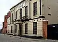 2 Islington Square, warehouse later used as a music academy(c.1830; Grade II)