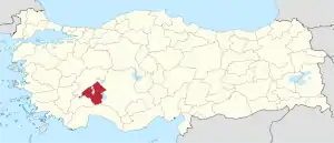 Isparta highlighted in red on a beige political map of Turkeym