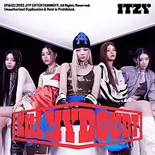 Five women (From left to right: Yuna, Ryujin, Lia, Yeji, and Chaeryeong) sitting on a cube, facing the camera behind a red word "KILL MY DOUBT" in the center