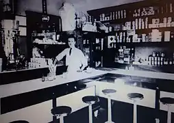 Interior of chili parlor with deli-style stools at a counter