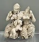 Two women and a child; 1400-1300 BC; ivory; height: 7.8 cm; National Archaeological Museum (Athens)