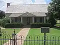 This 19th-century pioneer house, was constructed by physician and Confederate veteran J.C. Cornelius. The restored home now serves as a museum.