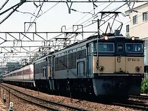 A 489 series EMU hauled by EF63 banking locomotives on an Hakusan service in June 1997