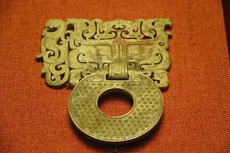 Ornamental handle with a bi disc; c.100 BC; jade; 18 x 14 cm; Museum of the Mausoleum of the Nanyue King (Guangzhou, Guangdong, China)
