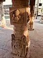 Detailed carvings on the pillar