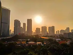 A view of Jakarta's skyline during the golden hour