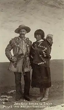 Jake Gold and unidentified Pueblo woman with child, ca. 1885–1890.
