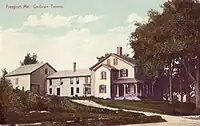The main building, its rear wing, and barn in 1915